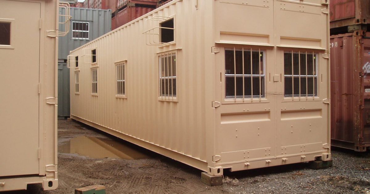 A American Container's buildout with multiple barred windows and A/Cs