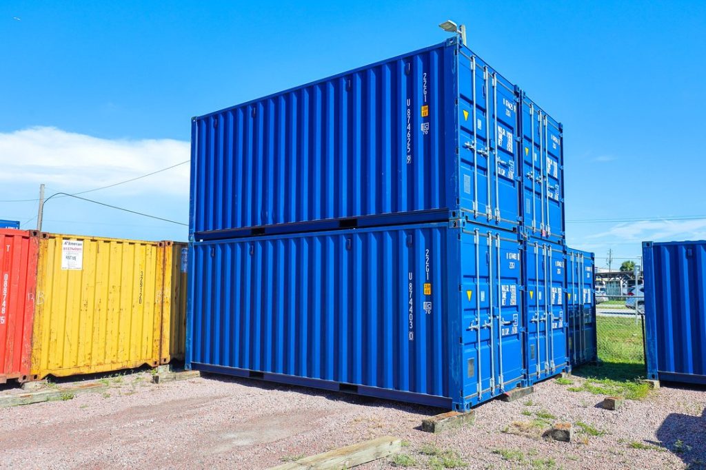 blue 20-foot containers stacked
