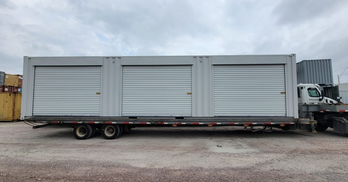 container on delivery truck at A American Container lot in Tampa