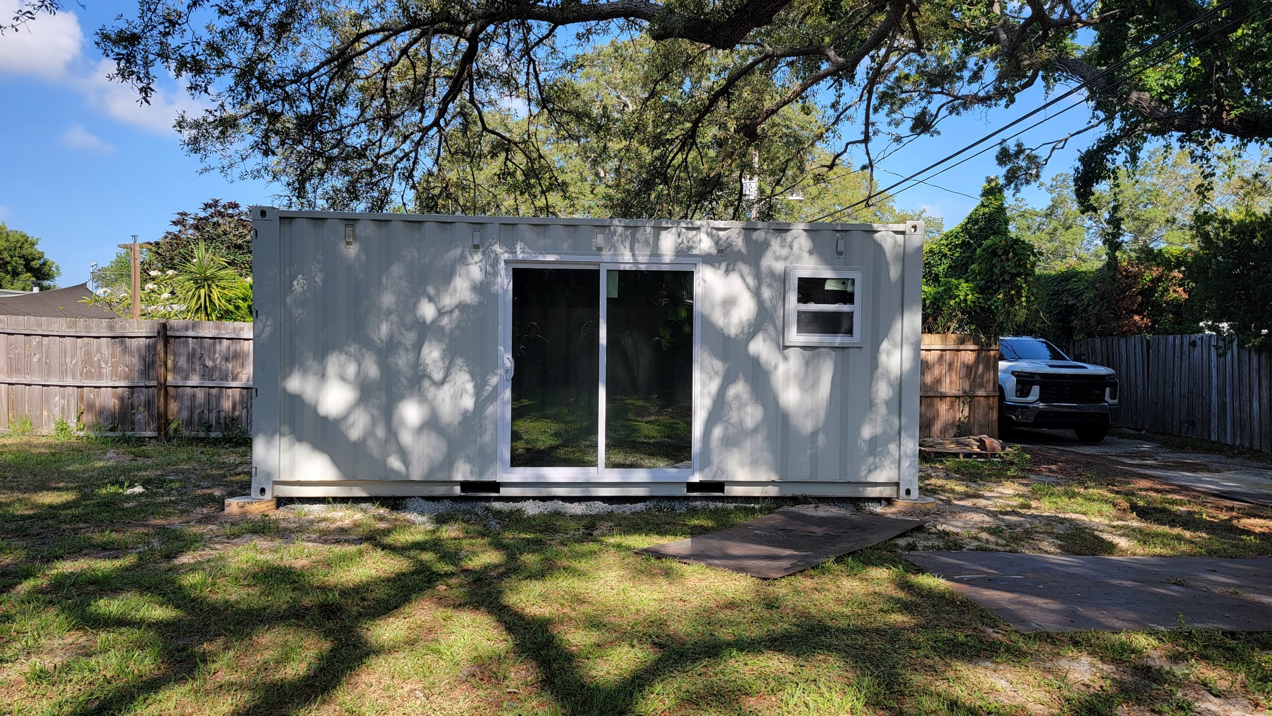 container she shed with sliding glass door