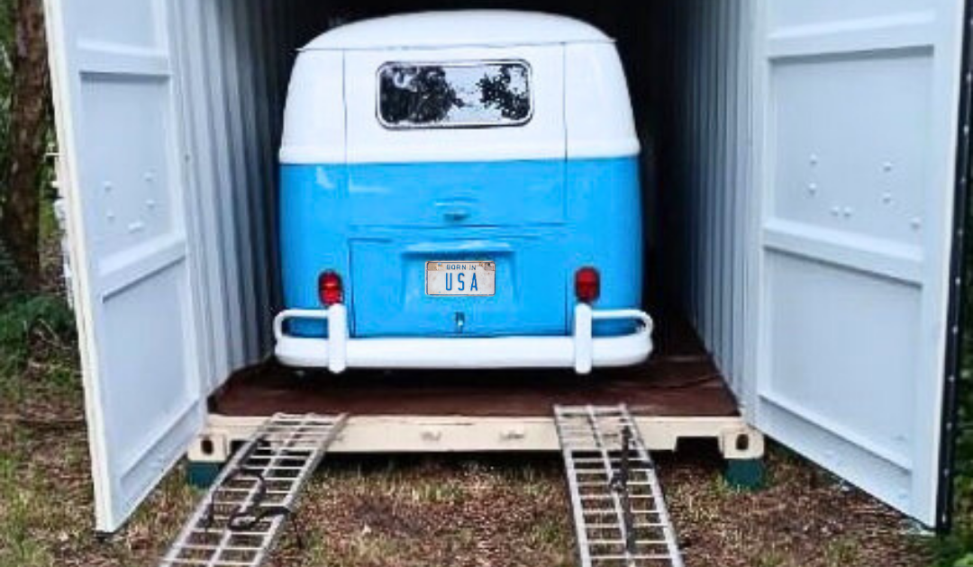 Blue and white VW inside garage container