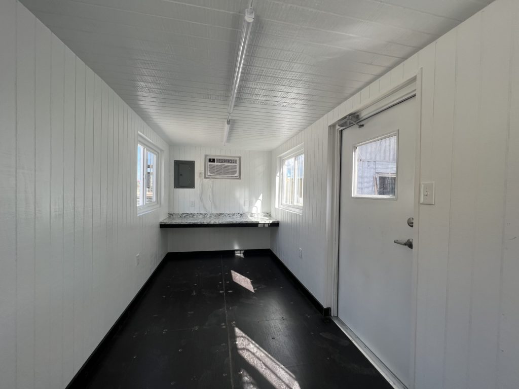 inside 20-foot shipping container with electrical modification 